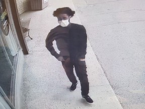 London police have released a second photo of a person of interest in their investigation into at least six complaints about the so-called grandparents scam, where people have given large sums of money to help a family member they were falsely told is in legal trouble. London police handout photo