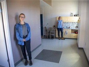 Jessica Mostert-Thiessen (foreground), program manager of Indwell's Railway City Lofts in St. Thomas, and Natasha Thuemler, regional manager of Indwell, stand in one of the affordable housing apartments in the facility. (Derek Ruttan/The London Free Press)