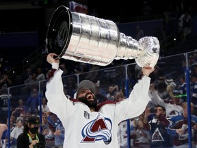Nazem Kadri of the Colorado Avalanche lifts the Stanley Cup after defeating the Tampa Bay Lightning 2-1 in Game Six of the 2022 NHL Stanley Cup Final at Amalie Arena on June 26, 2022 in Tampa, Florida. (Bruce Bennett/Getty Images)
