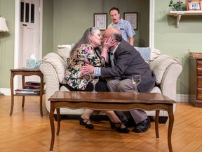 Corrine Divine (played by Susan Johnston Collins) gets caught smooching on the couch with her date, Randy (Murray Furrow), by her adult son, Jim Devine (Reid Janisse), in the world premiere of iconic Canadian playwright Norm Foster's My Hero, on at Port Stanley Festival Theatre until July 9.