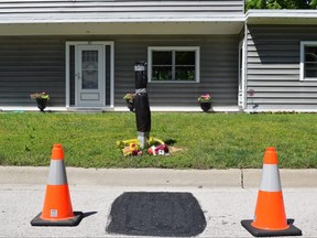 Union, Bell Canada mourn employee's London-area workplace death 2 Neighbours on Delavan Crescent in Tillsonburg laid flowers in memory of a 54-year-old technician who they say fell to his death from a ladder Monday when he was working on utility wires in front of one of the homes. Photo taken on Tuesday June 14, 2022. (CALVI LEON/The London Free Press)