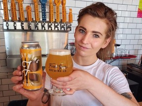 Mallory Cross-Kihs, manager of Fixed Gear’s Alma Street Tasting Room, is ready to serve a new witbier made from butterfly yeast. (Fixed Gear photo)