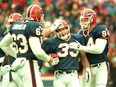 Running back Tim Tindale, one of the best football players ever to come out of Western University is congratulated by teammates while playing for the NFL's Buffalo Bills. (AFP photo)