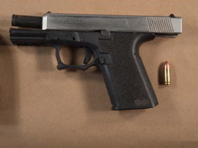 London police arrested four men and seized a loaded handgun, shown here, after a group of men threatened an undercover police officer parked his vehicle on Marconi Boulevard Monday. (Police supplied photo)