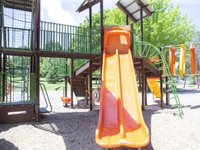 A sheet of plywood blocks the top of a slide in Pinafore Park in St. Thomas on Friday, June 10, 2022. Vandals have done $20,000 damage to playground equipment, signs and benches at the park, St. Thomas police say. Derek Ruttan/The London Free Press