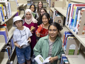 Oakridge secondary school is celebrating the graduation of its its first class of International Baccalaureate diploma students, including, from front, Nabeeha Anwar, Amy Zhang, Nina Yue, Lubna Abdellah, Eve Steenholdt, Helen Zhou and Olivia Flooris. (Mike Hensen/The London Free Press)