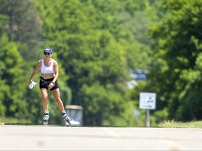 Susan Solonevitch of London gets in an inline skating workout amid the blistering heat on Wednesday June 15, 2022. (Mike Hensen/The London Free Press)
