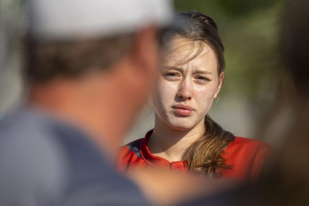 Mariia Romanova, 17, listens to the head coach of the Woodstock-based D1 Nationals U-19 team before a recent exhibition game in Belmont. (Mike Hensen/The London Free Press)