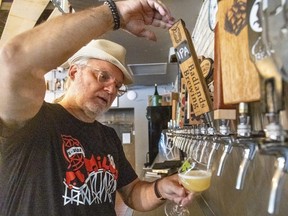 Milos Kral has a long background in the hospitality business, but his Craft Beer Emporium in downtown London is his first venture as an owner. He says he's humbled by the customers who patronize his pub that is 10 years old this month. Photo taken on Friday, June 17, 2022. (Mike Hensen/The London Free Press)