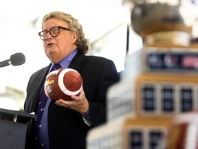 London Mayor Ed Holder jokes around with a football during an announcement Thursday, June 23, 2022, that the 57th Vanier Cup will be played at Western Alumni Stadium in London on Nov 26. (Mike Hensen/The London Free Press)