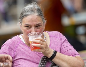 Peggy Churney enjoys a margarita flavored beer.