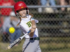 Heidi Graham of the U13 Byron Optimist 1 girls softball team fouls off a pitch down the first base line while playing against Byron Optimist 2 at the Byron Optimist fields on Boler Road on Tuesday June 28, 2022. (Mike Hensen/The London Free Press)