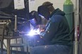 Students work on a welding project at B. Davison secondary school in London in this LFP Archives photo from January 2015. The technical school offers non-traditional courses such as welding, hairdressing, carpentry and baking. (Derek Ruttan/The London Free Press)