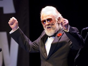Ronnie Hawkins plays to an energetic crowd at The Grand Theatre in London, Ont. on Nov. 5, 2013.