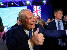 Ontario Premier Doug Ford gestures at his Ontario PC Party provincial election night watch party at the Toronto Congress Centre in Etobicoke June 2, 2022. PHOTO BY CARLOS OSORIO /REUTERS