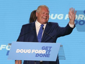 Doug Ford comes on stage at the Toronto Congress Centre to give his victory speech after winning a majority in the provincial election on June 2, 2022.