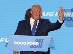 Doug Ford comes on stage at the Toronto Congress Centre to give his victory speech after winning a majority in the provincial election on June 2, 2022.