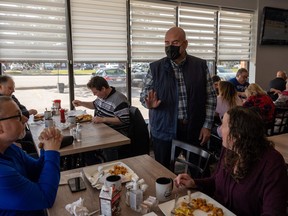 Ontario Liberal Leader Steven Del Duca greets guests at Frank's Place after announcing his plan to remove HST from prepared foods under $20 in Vaughan, Ont., Saturday, April 30, 2022.
