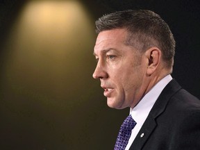 Former NHL player and child advocate Sheldon Kennedy speaks during a press conference on Parliament Hill in Ottawa, on the issue of child abuse and its impact on children in Canada, on Monday, Feb. 5, 2018.