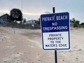 Some Ipperwash Beach lakefront cottage owners say installing signs stating, “Private beach no trespassing – private property to the water’s edge,” have helped explain the public-private boundaries there. (Terry Bridge/Postmedia Network)