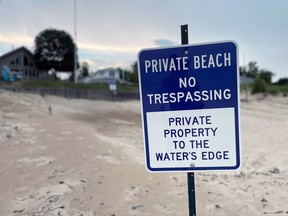 Some Ipperwash Beach lakefront cottage owners say installing signs stating, “Private beach no trespassing – private property to the water’s edge,” have helped explain the public-private boundaries there. Terry Bridge/Sarnia Observer