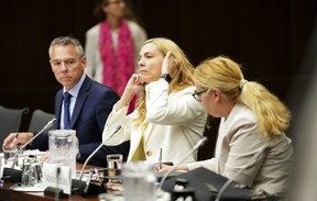 Witnesses Michel Ruest (from left to right), Senior Director, Programs, Sport Canada Branch of Canadian Heritage, Pascale St-Onge, Minister of Sports, and Isabelle Mondou, Deputy Minister of Canadian Heritage, appear before the Standing Committee on Heritage Canadian in Ottawa on Tuesday, July 26, 2022, examining Hockey Canada's involvement in sexual assault allegations in 2018. (THE CANADIAN PRESS/Sean Kilpatrick)