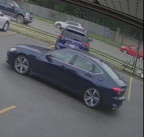 London police released a photo of blue Acura sedan they say was used by suspects in a shooting Wednesday night on Wonderland Road that injured a man.