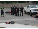 London police were investigating a Wednesday morning crash between a motorcycle and pickup truck outside Sherwood Forest Mall.  Photo taken on Wednesday July 20, 2022. (MEGAN STACEY/The London Free Press) 
