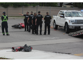London police were investigating a Wednesday morning crash between a motorcycle and pickup truck outside Sherwood Forest Mall. Photo taken on Wednesday July 20, 2022. (MEGAN STACEY/The London Free Press)