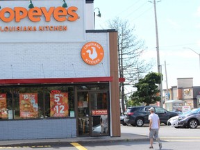 A London man faces charges after a pedestrian was killed in an alleged hit-and-run crash outside of the Popeyes at the corner of Wellington and Southdale roads. (DALE CARRUTHERS/The London Free Press)