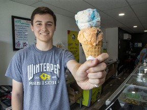 Dorchester's Tanner Zelenko, 21, who started The Frozen Cow ice cream shop in Dorchester at 16, and recently expanded to Thamesford, has this advice for budding young entrepreneurs: "Be prepared to work hard." (Derek Ruttan/The London Free Press)