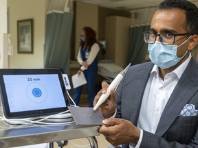 Dr. Anath Ravi is one of the creators of the MOLLI system, which helps detect breast cancer tumours. Strathroy Middlesex General Hospital is the first in Southwestern Ontario to use the technology, and it was officially unveiled on Thursday July 7, 2022. (Mike Hensen/The London Free Press)