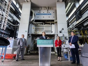 Federal Minister of Transport Omar Alghabra announced more than $500 million in incentives for medium- and heavy-duty zero-emission vehicles, helping businesses to switch to electric fleets. Alghabra was at the Fraunhofer centre at Western University, which researches composites of all types for automobiles, trucks and manufacturing in London. Photograph taken on Monday July 11, 2022. (Mike Hensen/The London Free Press)