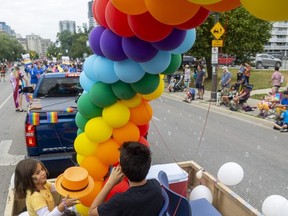 The crowds grew larger as the parade approached Victoria Park.