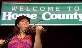 Londoner Jennie Bice plays the violin as part of the opening act of the festival on Friday July 20, 2012 at the bandstand in Victoria Park.  (MIKE HENSEN/The London Free Press)