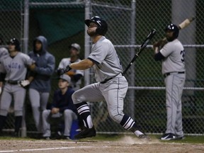 London Majors player Byron Reichstein watches his second solo home run of the game go out over the left field fence against the Toronto Maple Leafs in the third inning of Game 3 of the Intercounty Baseball championship in Toronto on Thursday, Sept. 30, 2021. (Jack Boland/Postmedia Network)