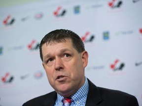 Hockey Canada COO Scott Smith speaks during a news conference in Vancouver on December 1, 2016.