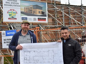 Craig Outhet, left, of Wheelhouse Brewing and Paul Vendittelli, economic development manager for the City of Prince Rupert, explain a $4-million project to convert a century-old abandoned CN passenger rail station from an eyesore into an ale house. It opens in the fall of 2022. (Wayne Newton photo)
