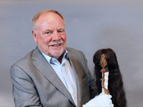 Chatham-Kent lawyer Doug Sulman holds a shrunken head that his great-grandfather George Sulman bought during his world travels and later donated to the Chatham-Kent Museum. Researchers at Western University have authenticated the head. More research is needed to confirm its purpose. (ELLWOOD SHREVE/Postmedia Network)