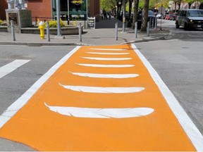 An illustration shows an orange crosswalk similar to the one that will be installed in downtown St. Thomas to honour Indigenous communities and residential school survivors.