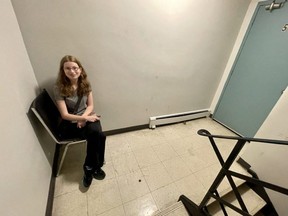 Amber Rankine sits on a chair in the fifth floor of her building at 470 Dundas St. that for the past six weeks had been without a working elevator following the strike of TSSA inspectors.  (JONATHAN JUHA/The London Free Press)