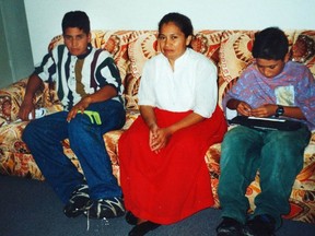 Walter Zepeda, right, 
 is shown in a family photo with his mother and brother. This LFP Archives photo was first published in 2003.