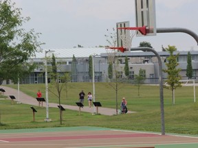 The individuals involved in a double stabbing in the White Oaks Mall parking lot Tuesday night may have come from an unsanctioned basketball game at White Oaks elementary school, shown here, London police said. (DALE CARRUTHERS/The London Free Press)
