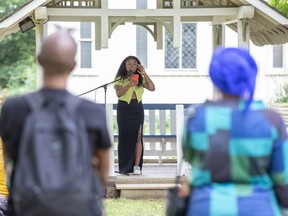 Fauzia Adetokunbo Agbonhin recites original poetry during Emancipation Day celebrations at Fanshawe Pioneer Village in London on Monday, Aug. 1, 2022. On Aug. 1, 1834, the Slavery Abolition Act came into effect in the British Empire. (Derek Ruttan/The London Free Press)