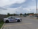 Police were investigating a homicide in the parking lot of the Home Depot store at 448 Clarke Rd. in London on Sunday, Aug 7, 2022. (Derek Ruttan/The London Free Press)