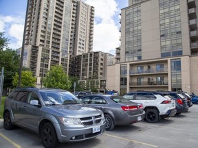 Parking spaces are scarce at 700 King St. in London. London city council voted last week to scrap rules that dictate a minimum number of parking spaces in transit villages and rapid transit corridors. Photograph taken on Tuesday, Aug. 9, 2022. Derek Ruttan/The London Free Press