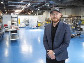 Nick Spina, chief executive of Ethey, which operates LiveFitFoods, discusses the acquisition of six related businesses and office space downtown from their production facility in London, Ont.  on Friday, Aug. 12, 2022. (Derek Ruttan/The London Free Press)