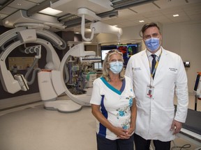 Dr. Michael Mayich, right, used a balloon distal access catheter to remove a blood clot from the brain of Wilene Leyen at University Hospital in London. Photo shot on Tuesday, Aug. 16, 2022. Derek Ruttan/The London Free Press