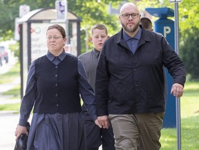 Herbert Hildebrandt arrives at court with his wife Julia in St. Thomas on Aug.  22, 2022. (Derek Ruttan/The London Free Press)