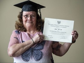 Dream come true: London-area grandmother June Howell shows off the high school diploma she earned this year at age 72. (Derek Ruttan/The London Free Press)
